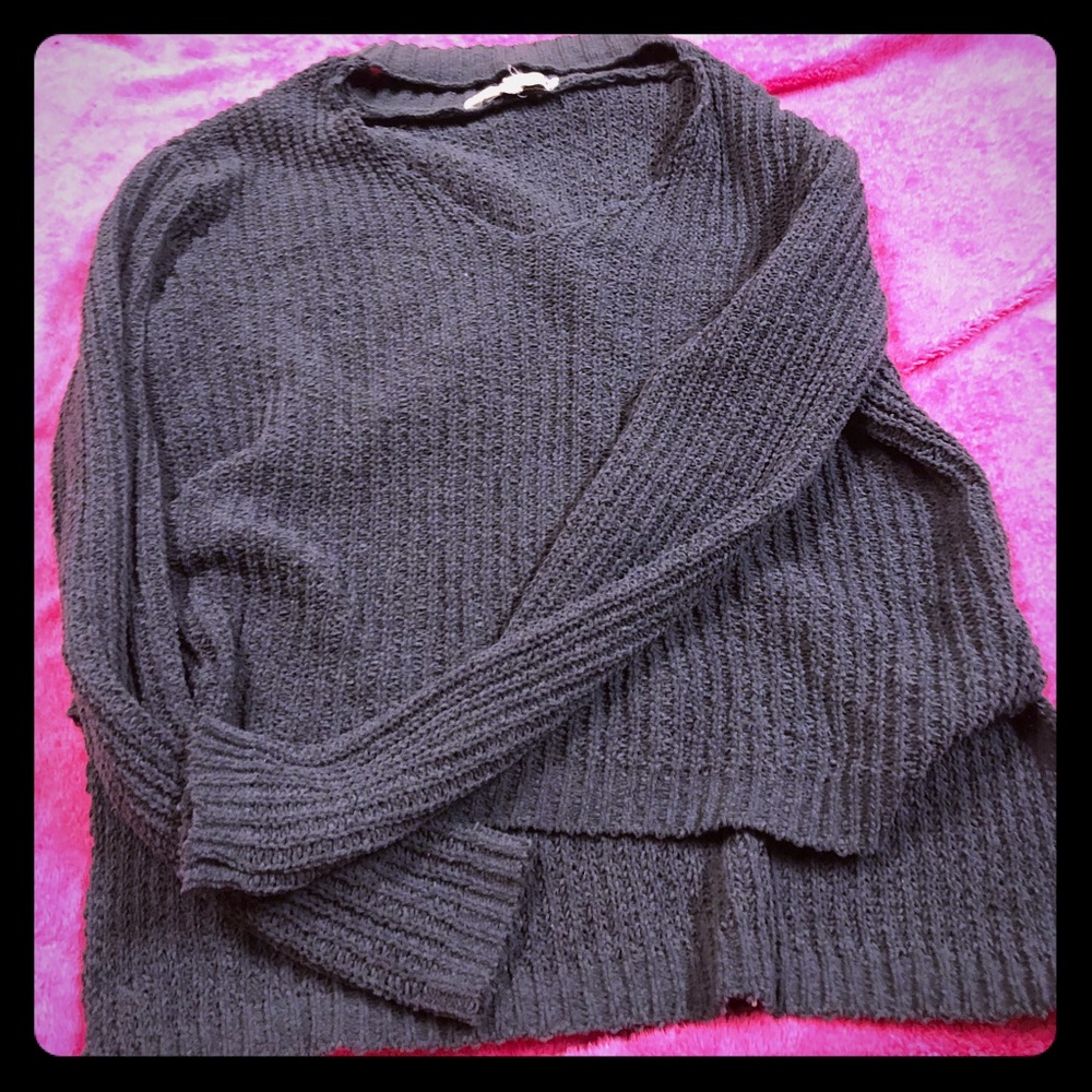 A sweater with a collar and the neck cut out